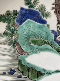 A Chinese famille verte dish with a rider falling from his horse, Chenghua mark, Kangxi