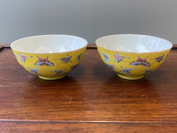 A pair of Chinese famille rose yellow-ground 'butterfly' bowls, Tongzhi mark and of the period