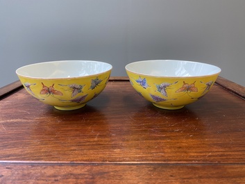A pair of Chinese famille rose yellow-ground 'butterfly' bowls, Tongzhi mark and of the period