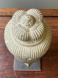 A Khmer polished sandstone head of Uma in Baphuon-style, Angkor period, Cambodia, 11th C.