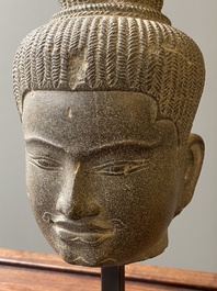 A Khmer polished sandstone head of Uma in Baphuon-style, Angkor period, Cambodia, 11th C.