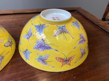 A pair of Chinese famille rose yellow-ground 'butterfly' bowls, Tongzhi mark and of the period