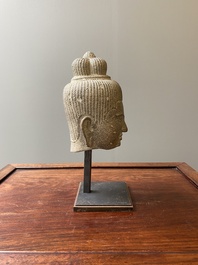 A Khmer polished sandstone head of Uma in Baphuon-style, Angkor period, Cambodia, 11th C.