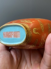 A small Chinese coral-ground 'hu' vase with gilt 'dragon and phoenix' design, Qianlong mark, Qing