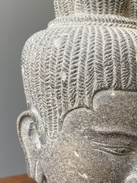 A Khmer polished sandstone head of Uma in Baphuon-style, Angkor period, Cambodia, 11th C.