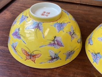 A pair of Chinese famille rose yellow-ground 'butterfly' bowls, Tongzhi mark and of the period