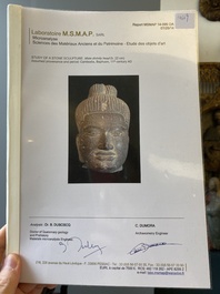 A Khmer polished sandstone head of Uma in Baphuon-style, Angkor period, Cambodia, 11th C.