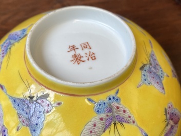 A pair of Chinese famille rose yellow-ground 'butterfly' bowls, Tongzhi mark and of the period