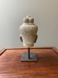 A Khmer polished sandstone head of Uma in Baphuon-style, Angkor period, Cambodia, 11th C.