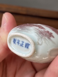 Four Chinese blue, white and copper-red snuff bottles, 19th C.