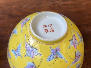 A pair of Chinese famille rose yellow-ground 'butterfly' bowls, Tongzhi mark and of the period