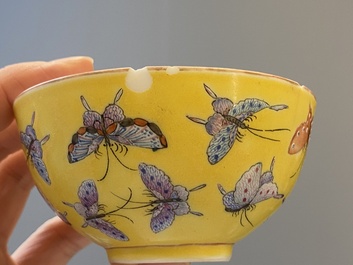 Five Chinese famille rose yellow-ground 'butterfly' bowls, Tongzhi mark and of the period