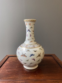 A Chinese famille rose 'butterfly' bottle vase, Guangxu mark and of the period