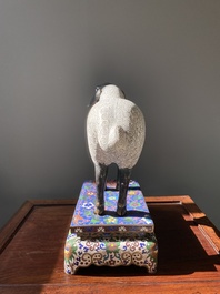 A Chinese cloisonn&eacute; model of a sheep standing on a rectangular base with Arabic inscription, Qing