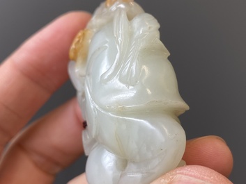 Two Chinese white and celadon jade carved standing boys, Qing