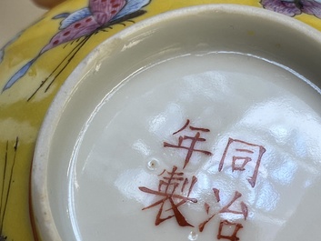 Four Chinese famille rose yellow-ground 'butterfly' bowls, Tongzhi mark and of the period