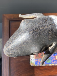 A Chinese cloisonn&eacute; model of a sheep standing on a rectangular base with Arabic inscription, Qing