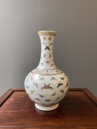 A Chinese famille rose 'butterfly' bottle vase, Guangxu mark and of the period