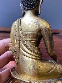 A Sino-Tibetan gilt bronze Medicine Buddha or Bhaishajyaguru, 16th C.
