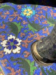 A Chinese cloisonn&eacute; model of a sheep standing on a rectangular base with Arabic inscription, Qing