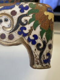 A Chinese cloisonn&eacute; model of a sheep standing on a rectangular base with Arabic inscription, Qing