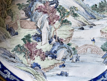 A pair of Chinese Canton enamel 'Master of the Rocks' plates, Yongzheng/Qianlong