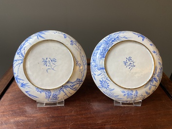 A pair of Chinese Canton enamel 'Master of the Rocks' plates, Yongzheng/Qianlong