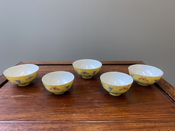 Five Chinese famille rose yellow-ground 'butterfly' bowls, Tongzhi mark and of the period