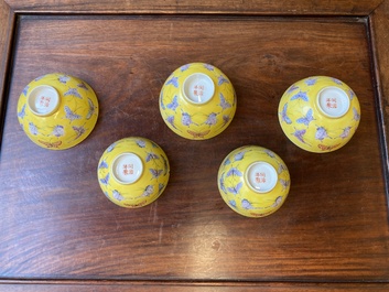 Five Chinese famille rose yellow-ground 'butterfly' bowls, Tongzhi mark and of the period