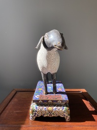 A Chinese cloisonn&eacute; model of a sheep standing on a rectangular base with Arabic inscription, Qing