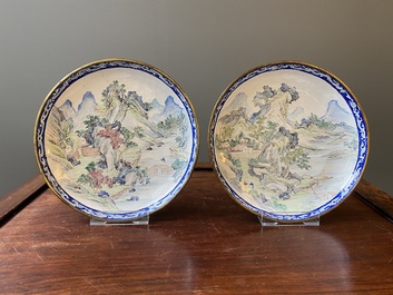 A pair of Chinese Canton enamel 'Master of the Rocks' plates, Yongzheng/Qianlong