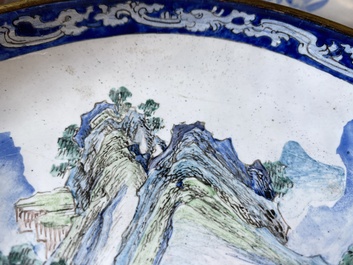 A pair of Chinese Canton enamel 'Master of the Rocks' plates, Yongzheng/Qianlong