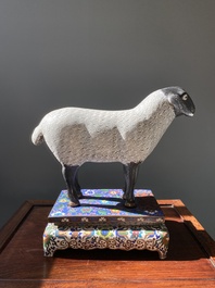 A Chinese cloisonn&eacute; model of a sheep standing on a rectangular base with Arabic inscription, Qing