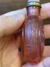 A Chinese ruby-pink glass 'bats' snuff bottle, Qianlong mark and of the period