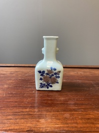 A small Chinese celadon-ground blue, white and copper-red bottle vase, Qianlong mark and of the period