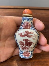 A Chinese blue, white and copper-red snuff bottle, Yongzheng mark and of the period