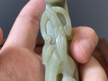 Two Chinese white and celadon jade belt hooks, Qing