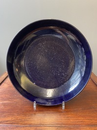 A Chinese monochrome aubergine-glazed dish, Qianlong mark and of the period