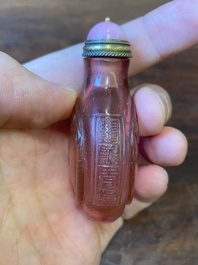 A Chinese ruby-pink glass 'bats' snuff bottle, Qianlong mark and of the period