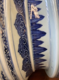 A large Chinese blue and white 'bajixiang' tripod censer with lotus scrolls, Qianlong