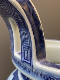 A large Chinese blue and white 'bajixiang' tripod censer with lotus scrolls, Qianlong