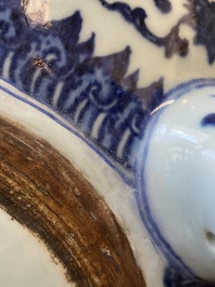 A large Chinese blue and white 'bajixiang' tripod censer with lotus scrolls, Qianlong