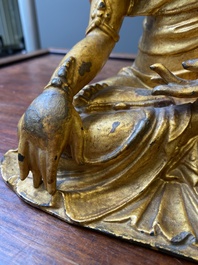 A fine Chinese gilt bronze sculpture of Shakyamuni Buddha, 15/16th C.