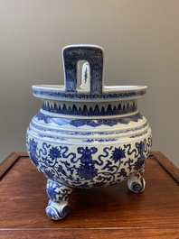 A large Chinese blue and white 'bajixiang' tripod censer with lotus scrolls, Qianlong