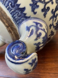 A large Chinese blue and white 'bajixiang' tripod censer with lotus scrolls, Qianlong