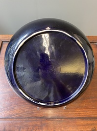 A Chinese monochrome aubergine-glazed dish, Qianlong mark and of the period