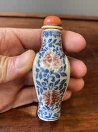 A Chinese blue, white and copper-red snuff bottle, Yongzheng mark and of the period