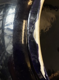 A Chinese monochrome aubergine-glazed dish, Qianlong mark and of the period