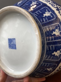 A Chinese blue and white 'hu' vase with lotus scrolls, Qianlong mark, 19th C.