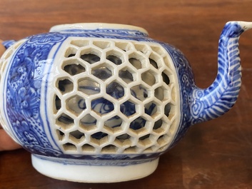 A pair of Chinese reticulated and double-walled blue and white teapots, Transitional period